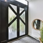 The entrance with a black door KTK Home Boutique